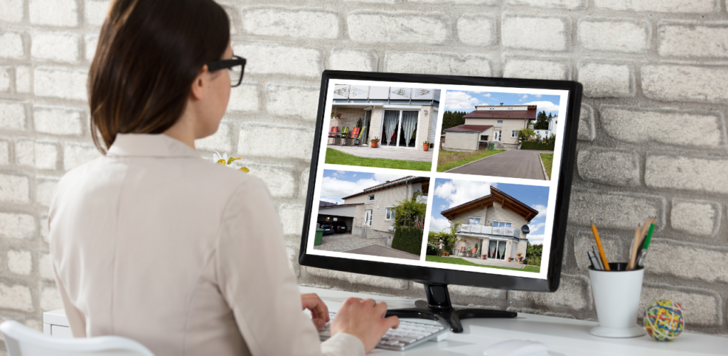 Property Management Woman viewing property photos on a computer monitor, showing four images of different houses